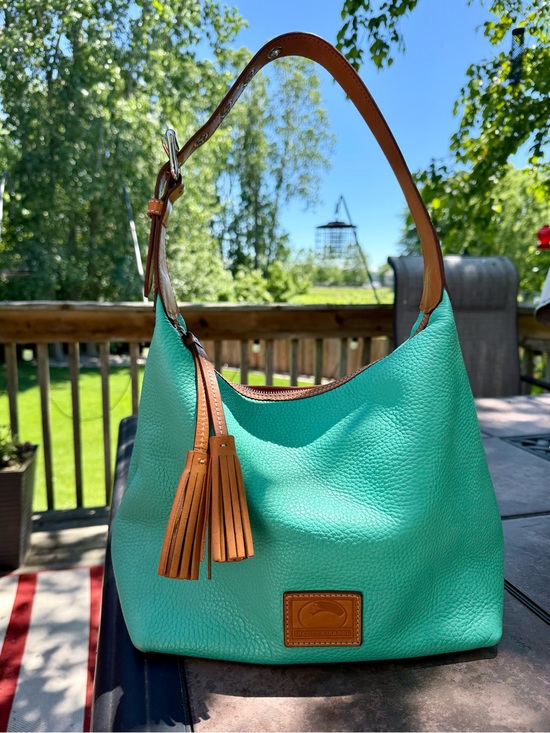 Dooney & Bourke Handbags - Dooney & Bourke Turquoise Pebbled Leather Shoulder Hobo bag w/ Tan Trim Tassel